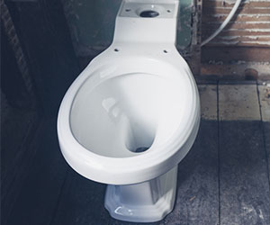 how to fix a running toilet with a button flush